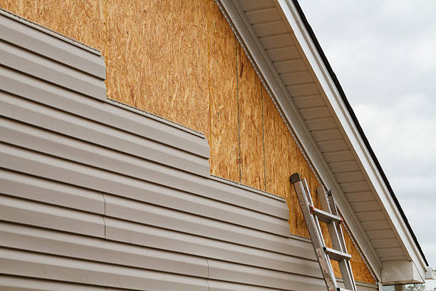 Professional Storm Damage Siding Repair technician working in Franklin Park, NJ